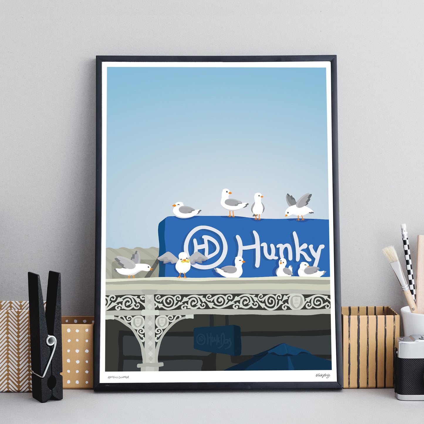 colourful funny art print of sea gulls eating chips on tin roof of Hunky Dory with victorian cast iron lattice and blue sky backdrop